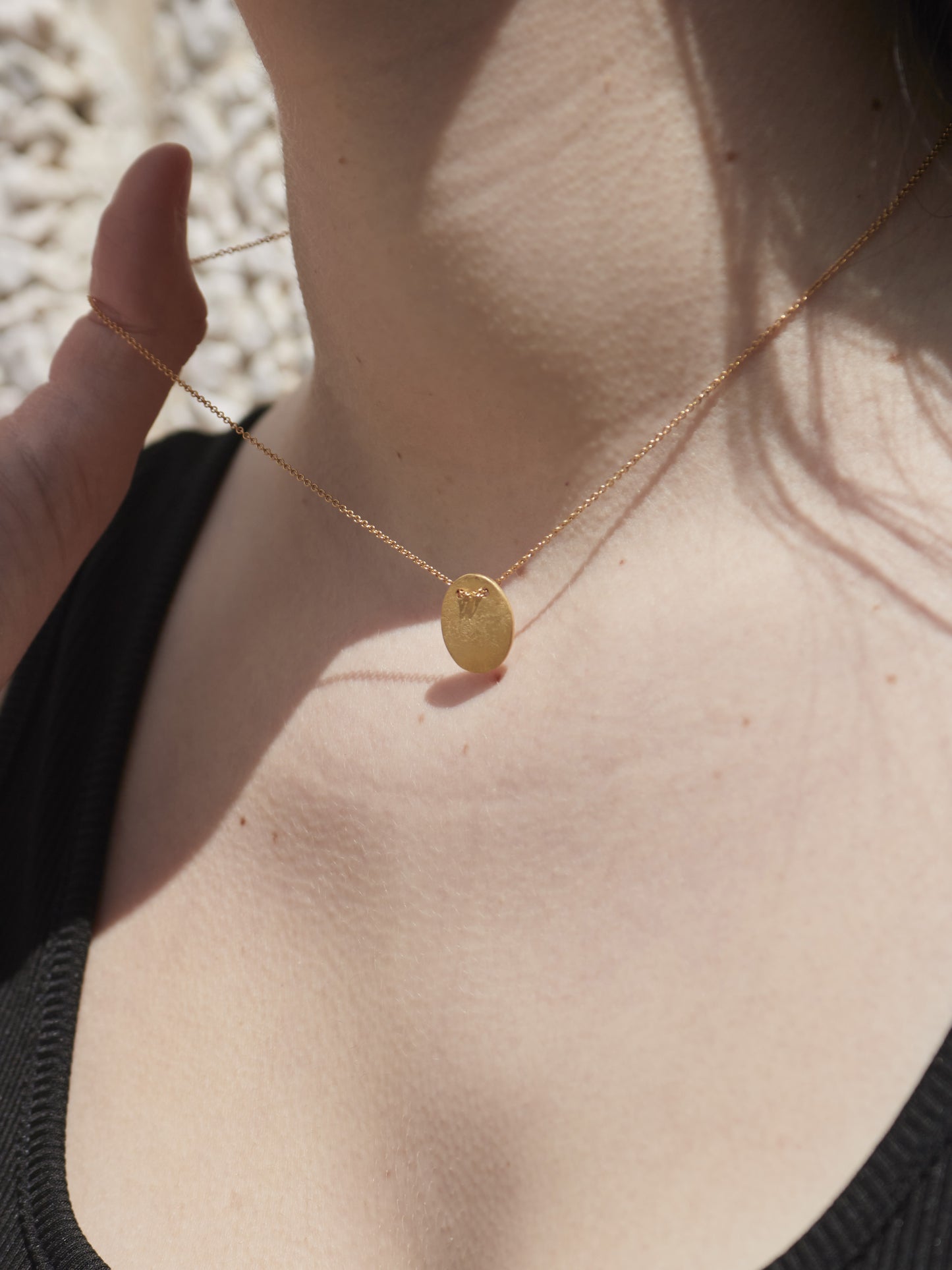 collier médaille Milos