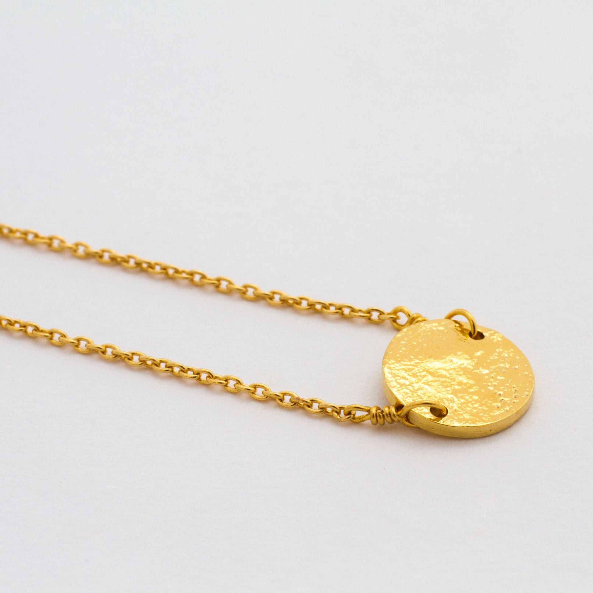 bracelet fin médaille or